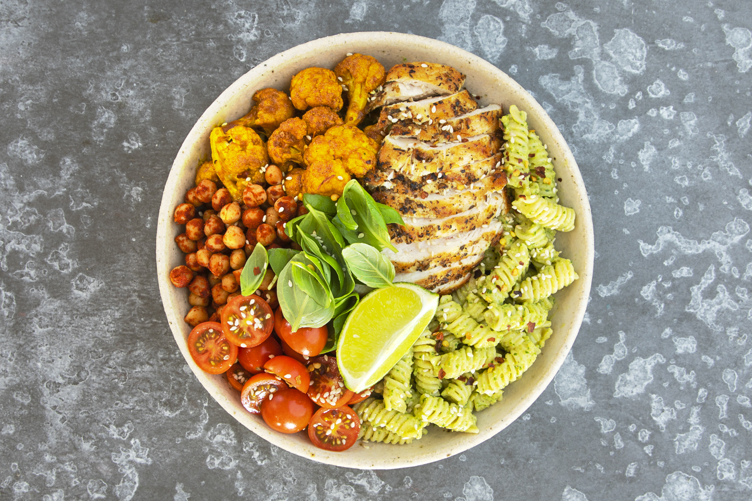 Nourish Bowl With Grilled Chicken And Avocado Pesto San Remo